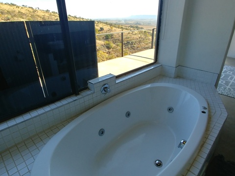 Sunset Lodge - En-suite bathroom 1 view beautiful view from the spa bath